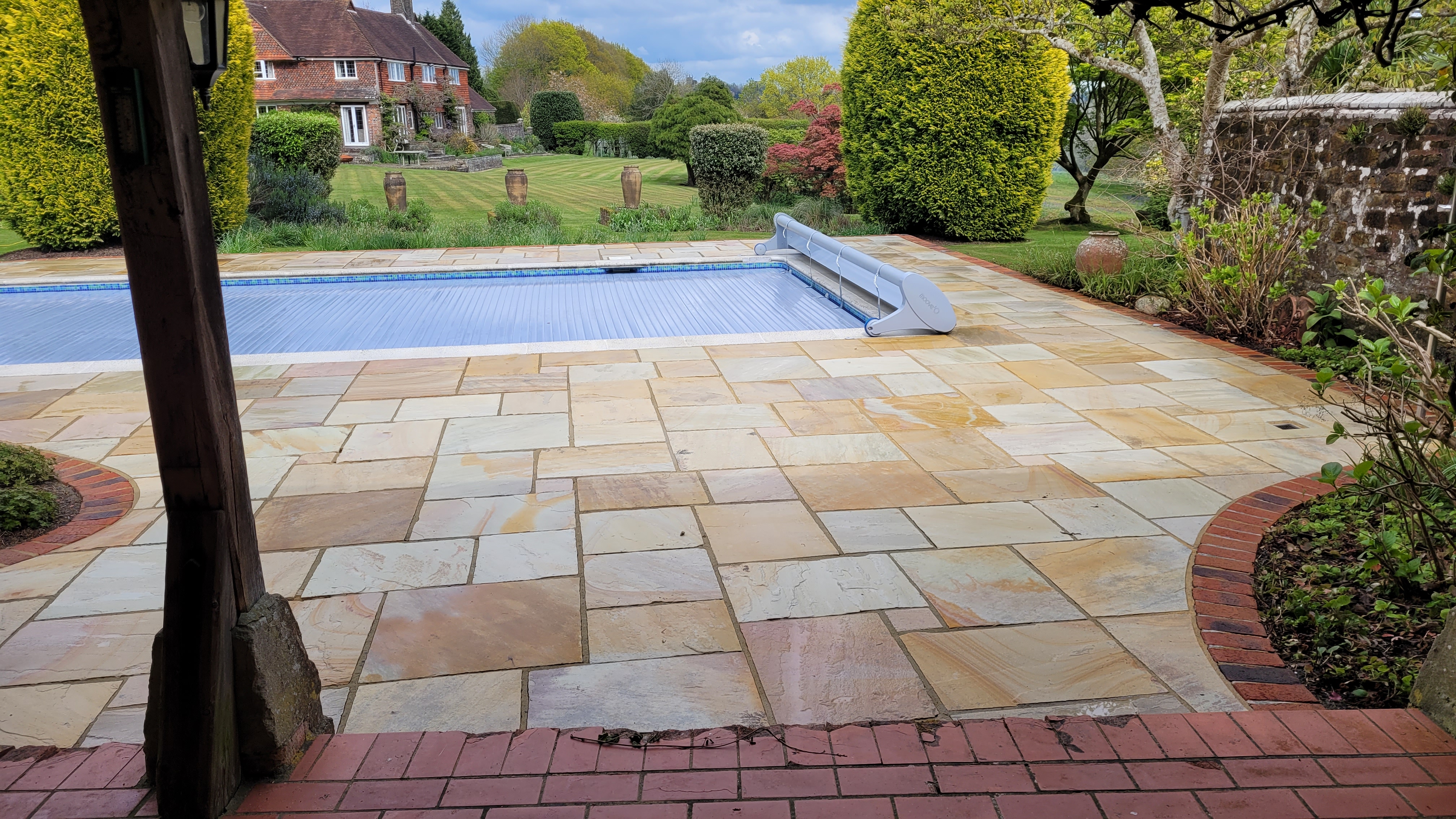 Swimming pool surround area cleaning, sandstone patio cleaning 58