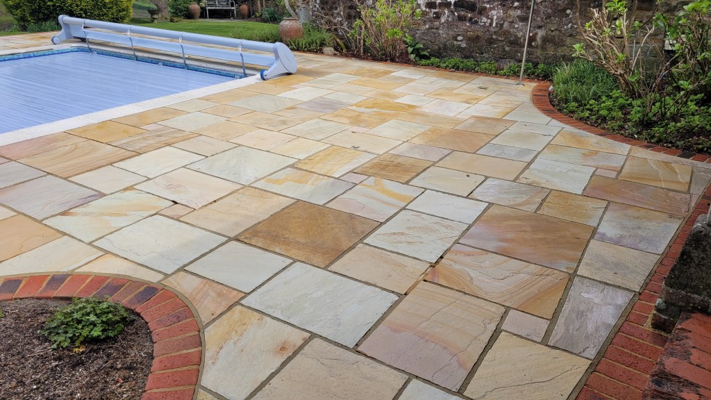 Swimming pool surround area cleaning, sandstone patio cleaning 61