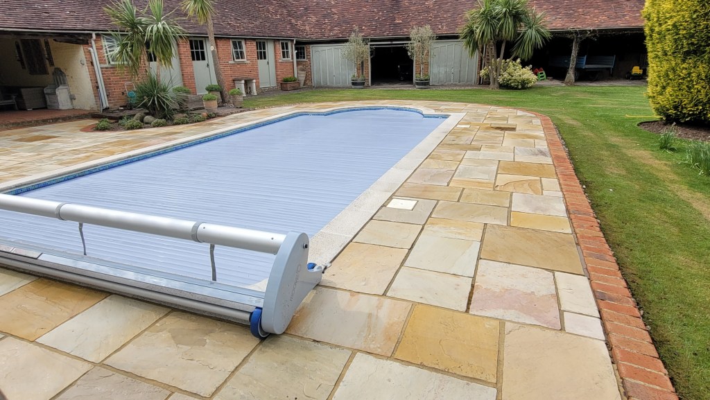 Swimming pool surround area cleaning, sandstone patio cleaning 65